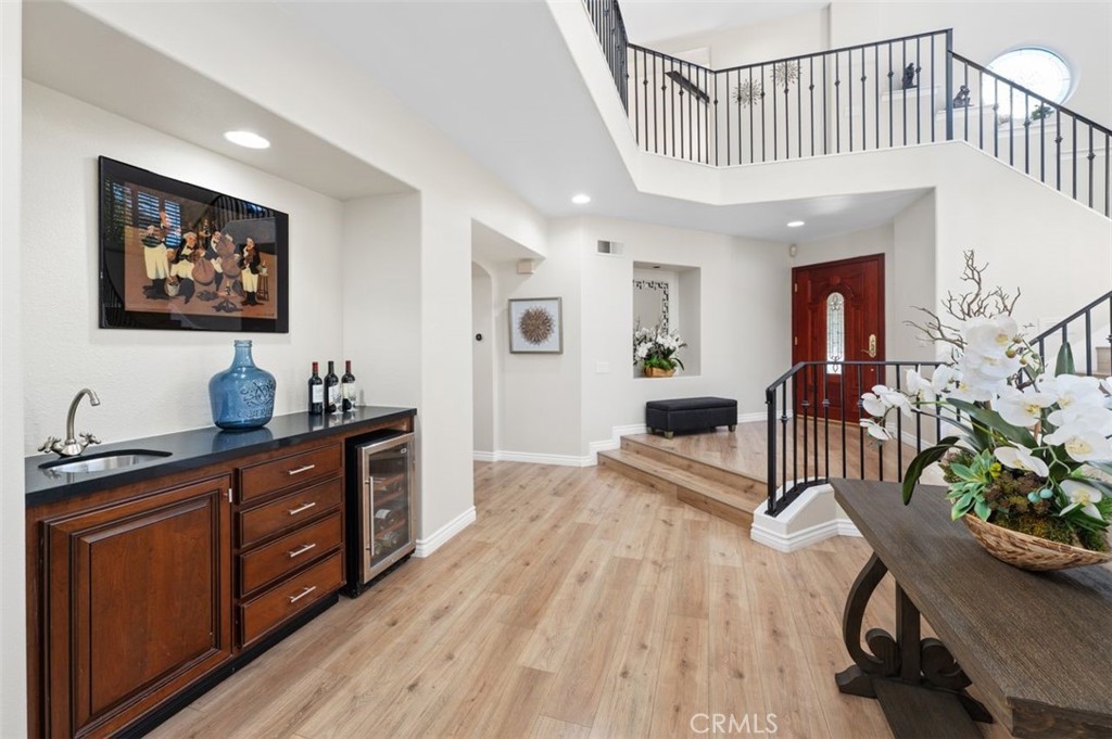 6 Beaconsfield Rancho Santa Margarita, CA 92679 - Photo 5 of 51 Beautiful wrought-iron staircase, & wine refrigerator is included