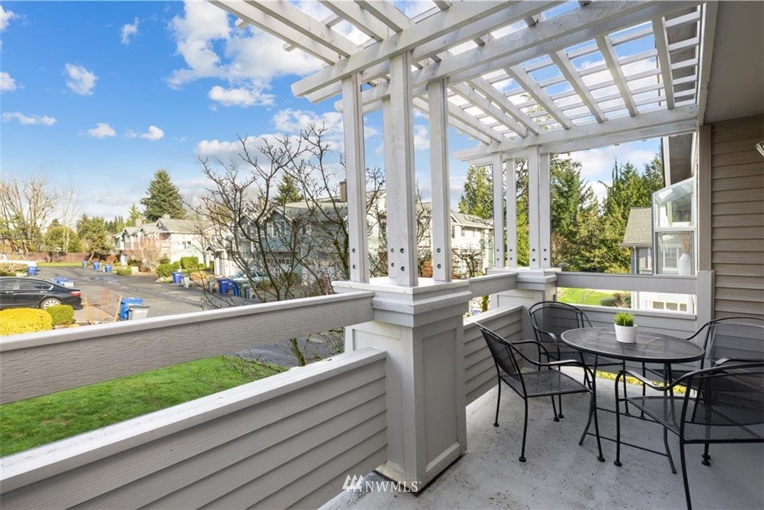 22709 4th Avenue West, Unit 105 Bothell, WA 98021 - Photo 13 of 32 a view of a patio with chairs and table in patio