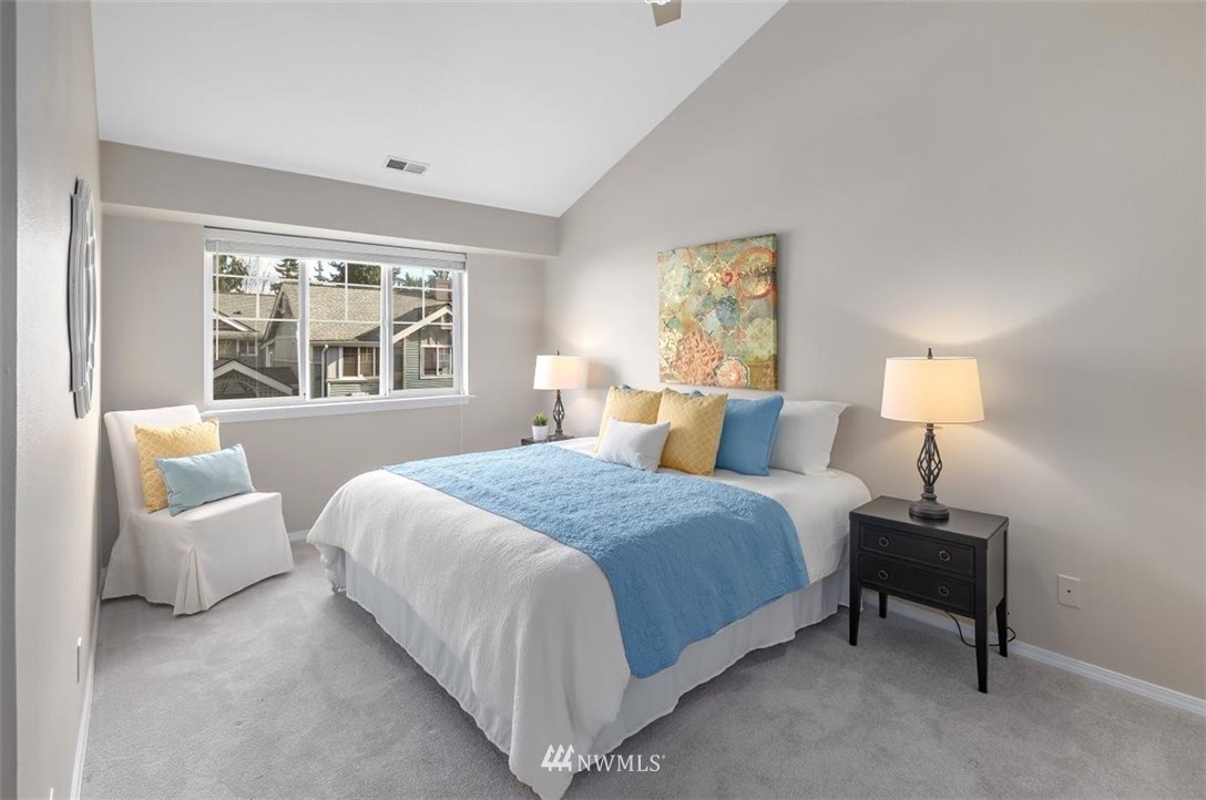 22709 4th Avenue West, Unit 105 Bothell, WA 98021 - Photo 21 of 32 a bedroom with a bed and a couch