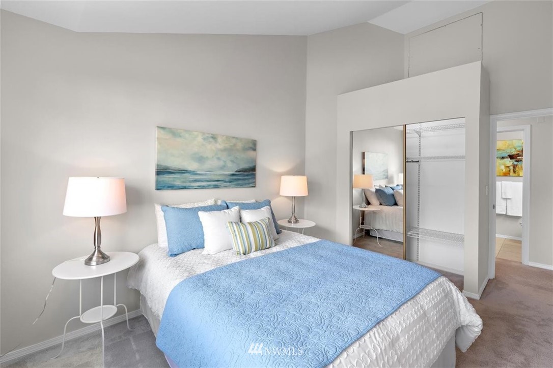 22709 4th Avenue West, Unit 105 Bothell, WA 98021 - Photo 26 of 32 a bedroom with a bed and a lamp