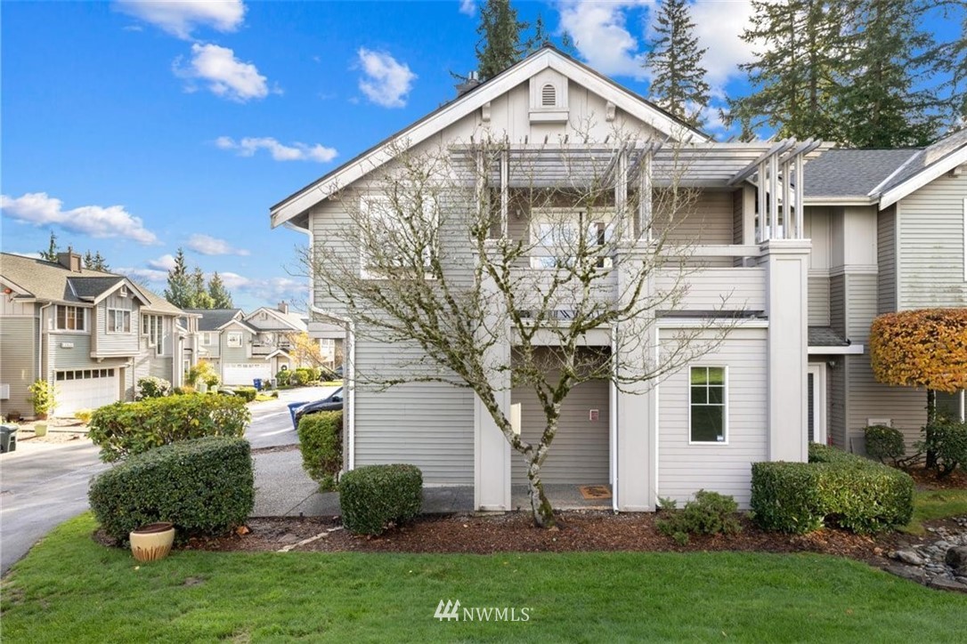 22709 4th Avenue West, Unit 105 Bothell, WA 98021 - Photo 29 of 32 a front view of a house with garden