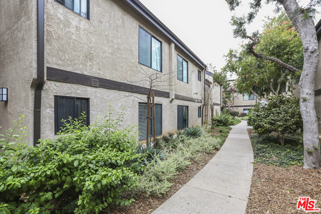 8110 Manitoba Street, Unit 105 Playa del Rey, CA 90293 - Photo 2 of 28 a view of a pathway with a house