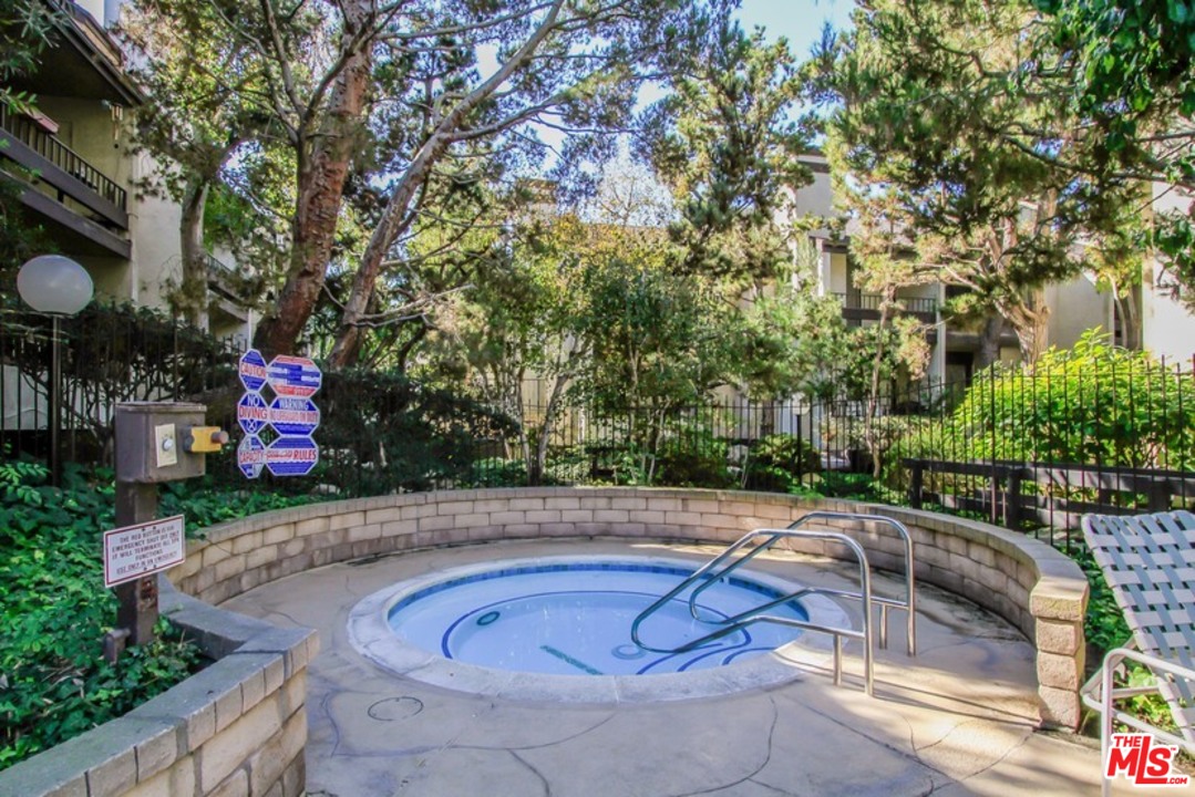 8110 Manitoba Street, Unit 105 Playa del Rey, CA 90293 - Photo 24 of 28 a view of yard with swimming pool and sitting area