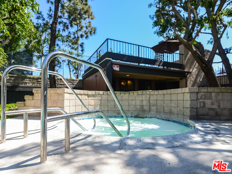8110 Manitoba Street, Unit 105 Playa del Rey, CA 90293 - Photo 27 of 28 a view of a door with a small garden