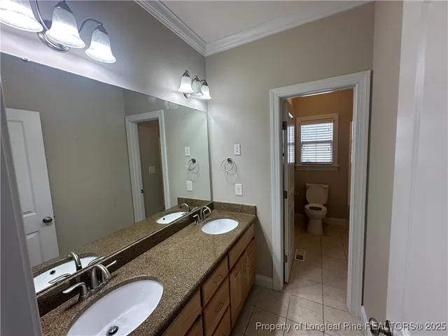 a bathroom with a sink and a shower