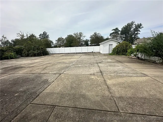 a view of a house with a yard and plants