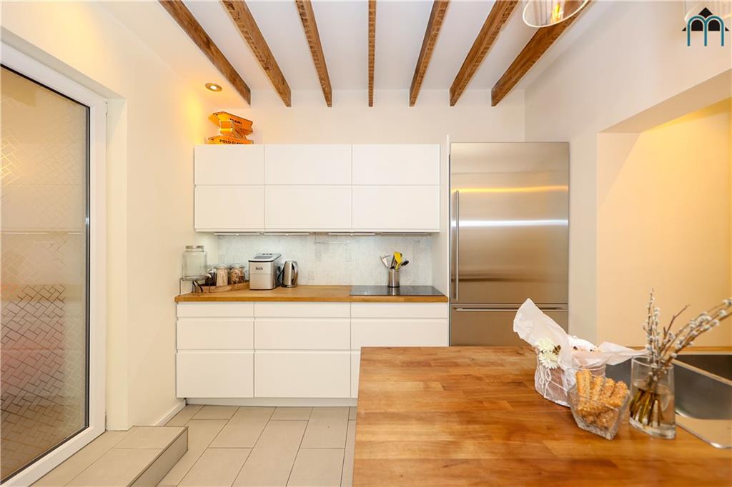 2 Brighton 4th Road Brooklyn, NY 11235 - Photo 11 of 31 a kitchen with a sink and cabinets