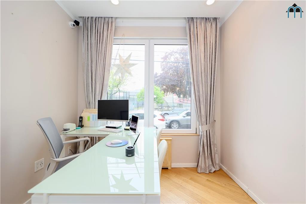 2 Brighton 4th Road Brooklyn, NY 11235 - Photo 20 of 31 a work room with a large window and furniture