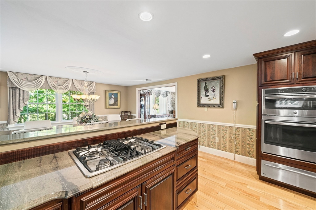 5 Lehan Street Canton, MA 02021 - Photo 11 of 27 a kitchen with a stove and a refrigerator