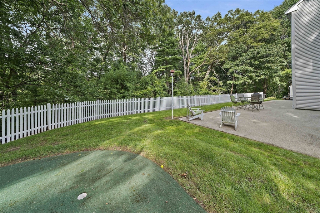 5 Lehan Street Canton, MA 02021 - Photo 27 of 27 a view of a backyard with a tree