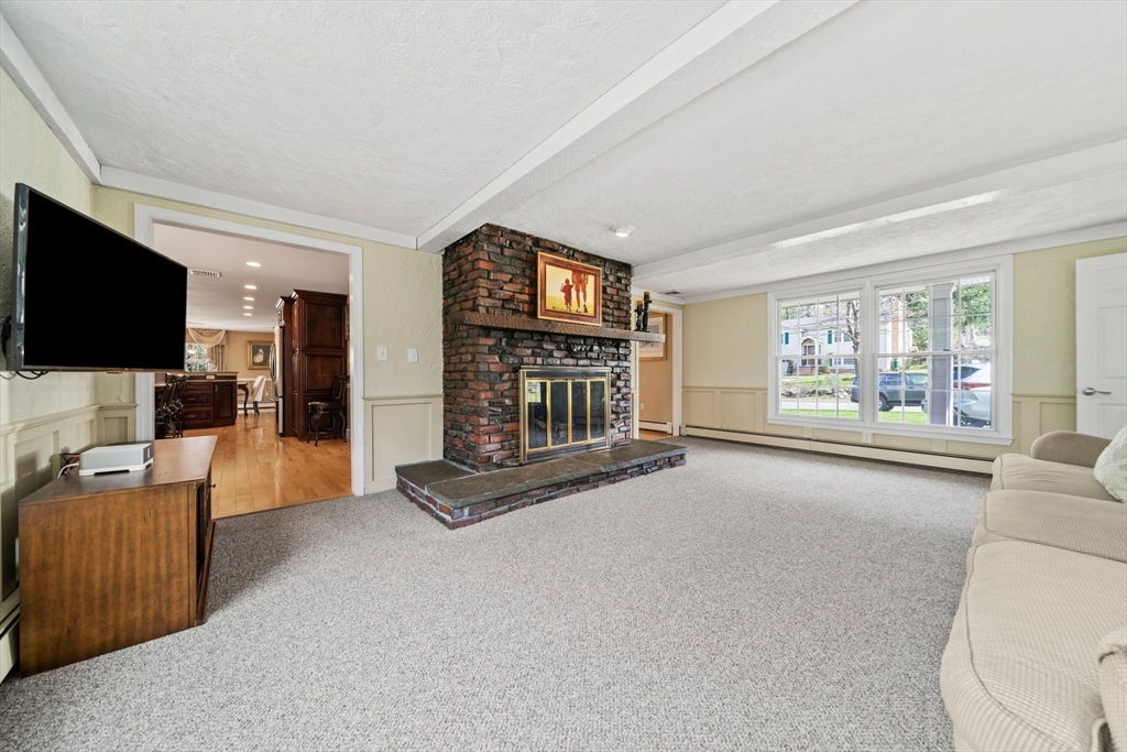5 Lehan Street Canton, MA 02021 - Photo 4 of 27 a living room with furniture and a flat screen tv