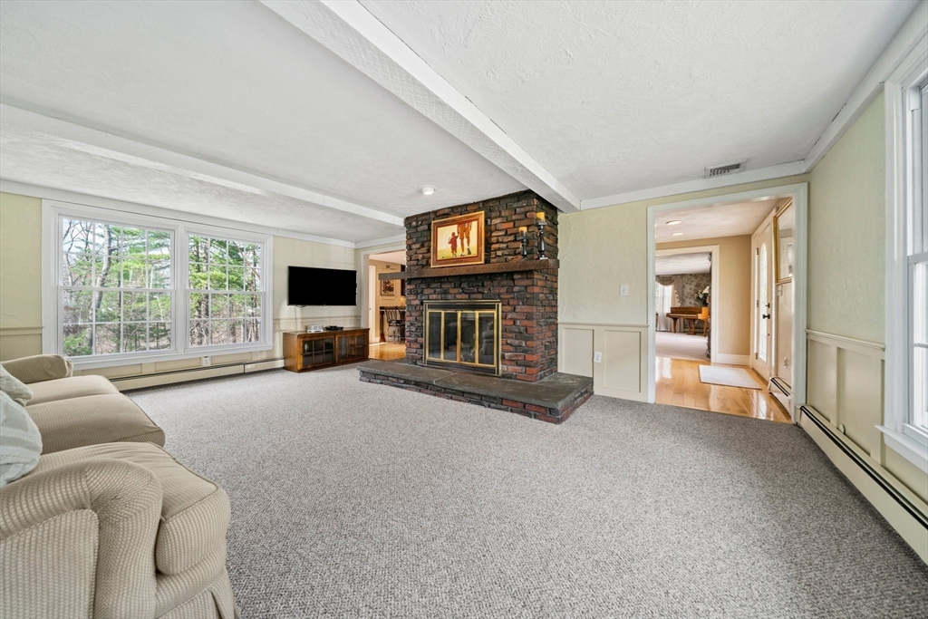 5 Lehan Street Canton, MA 02021 - Photo 5 of 27 a living room with furniture and a fireplace