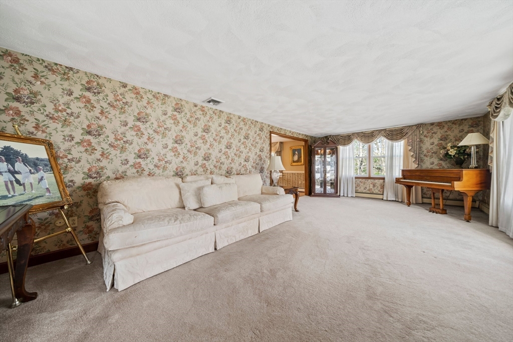 5 Lehan Street Canton, MA 02021 - Photo 7 of 27 a living room with furniture and a large window