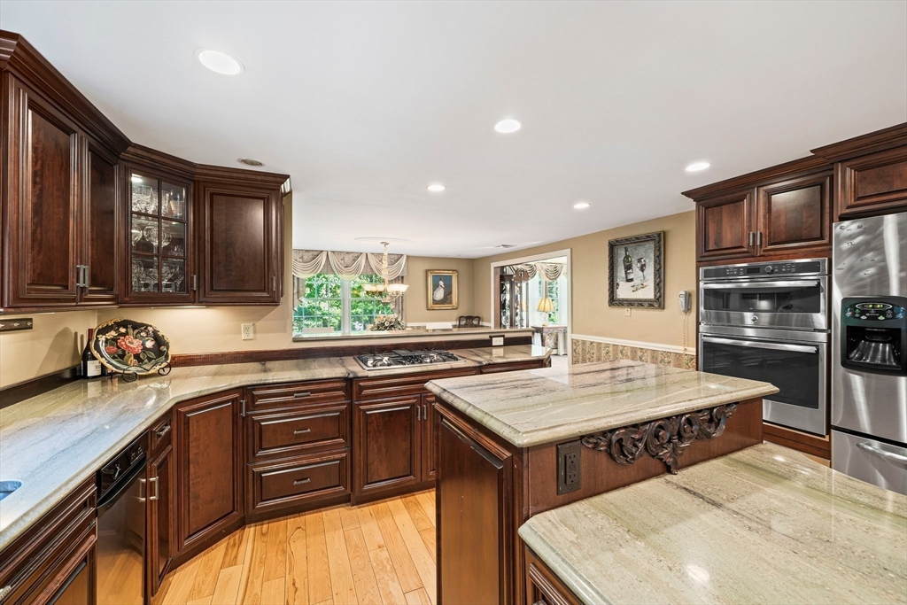 5 Lehan Street Canton, MA 02021 - Photo 10 of 27 a kitchen with a stove a sink and a refrigerator