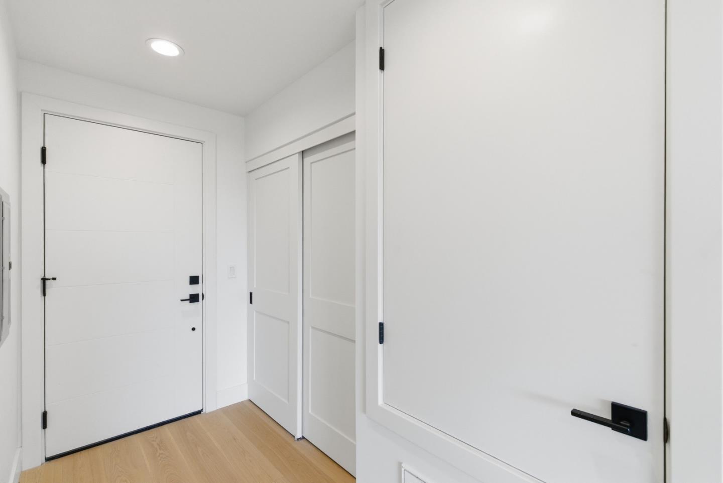 560 El Camino Real, Unit 406 San Carlos, CA 94070 - Photo 38 of 48 a view of a hallway with wooden floor