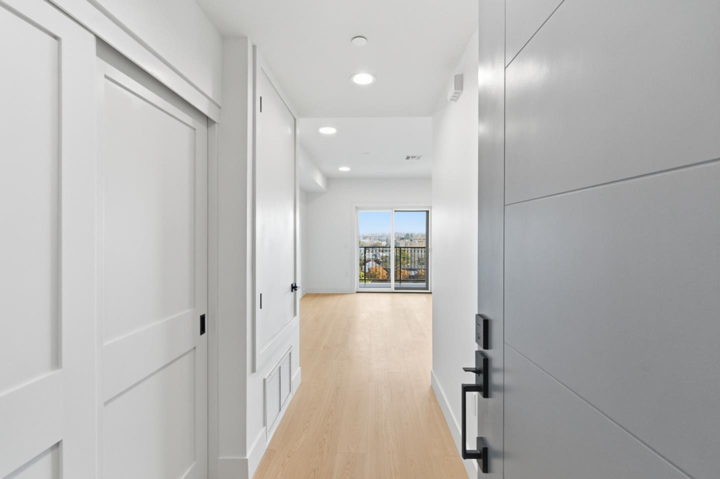 560 El Camino Real, Unit 406 San Carlos, CA 94070 - Photo 4 of 48 a view of a hallway with wooden floor