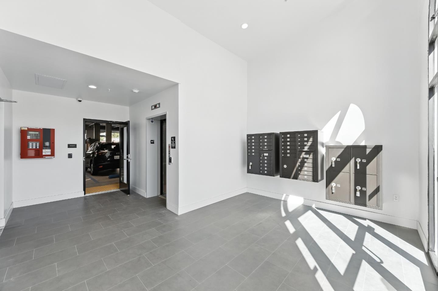 560 El Camino Real, Unit 406 San Carlos, CA 94070 - Photo 42 of 48 a view of a livingroom with furniture and a chandelier