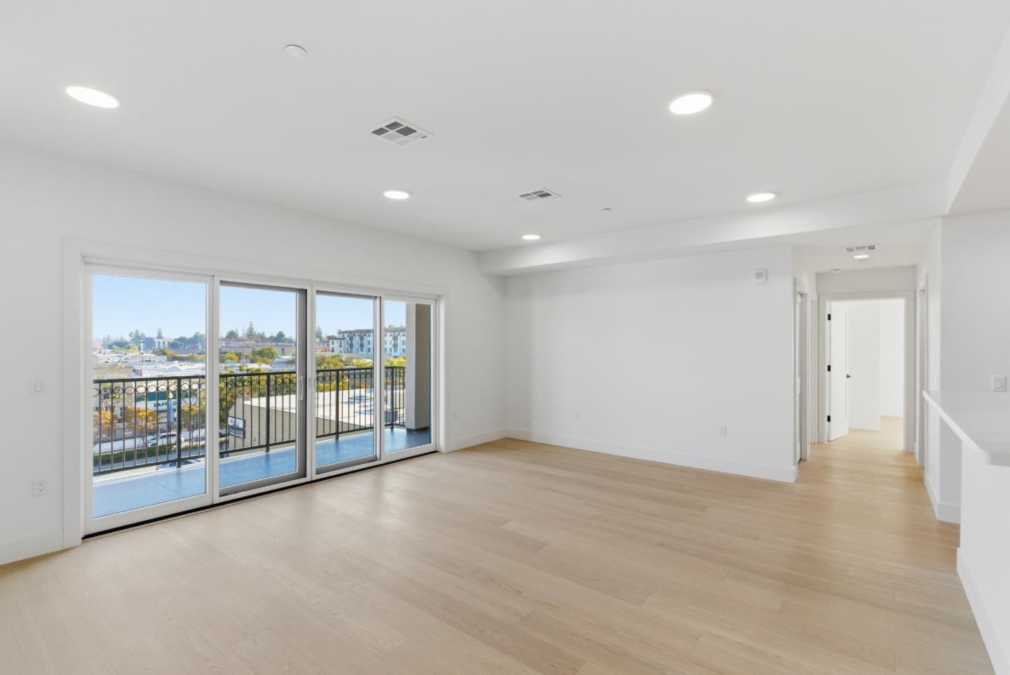 560 El Camino Real, Unit 406 San Carlos, CA 94070 - Photo 5 of 48 a view of an empty room with glass door