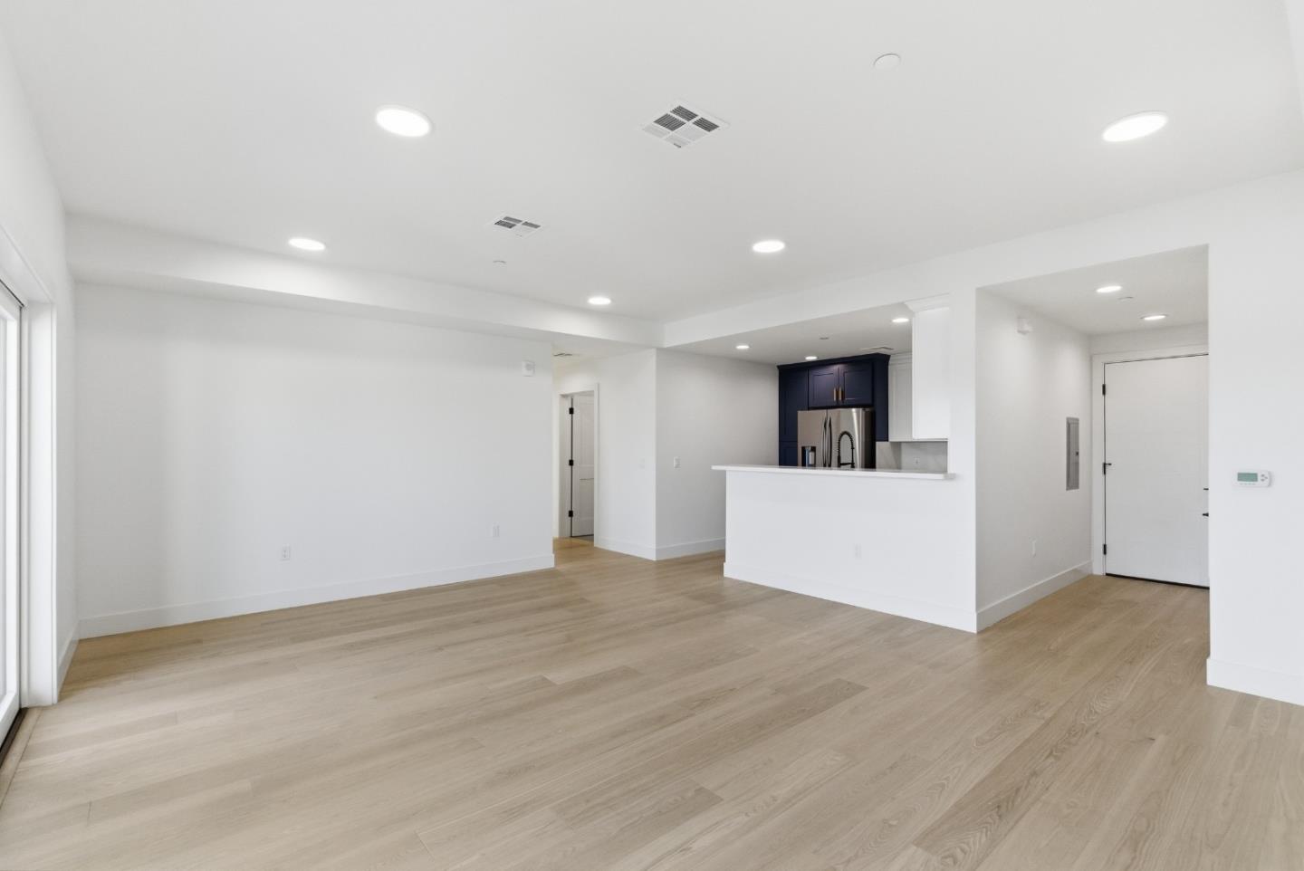 560 El Camino Real, Unit 406 San Carlos, CA 94070 - Photo 6 of 48 a view of a big room with kitchen and a window