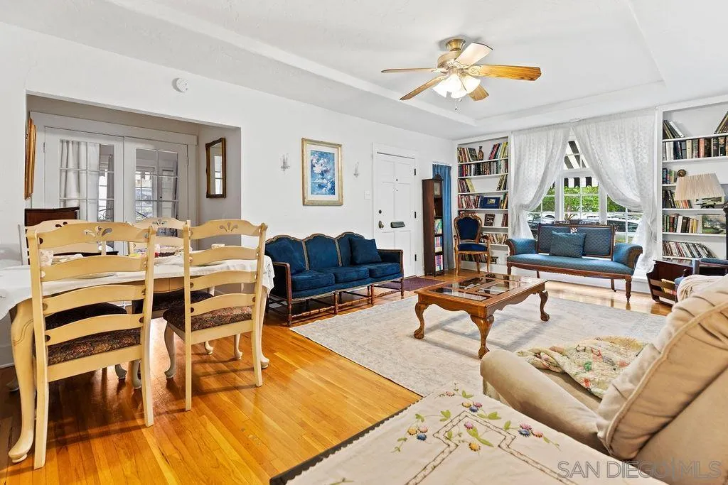 4531 Date Avenue La Mesa, CA 91941 - Photo 12 of 34 a living room with furniture kitchen view and a large window