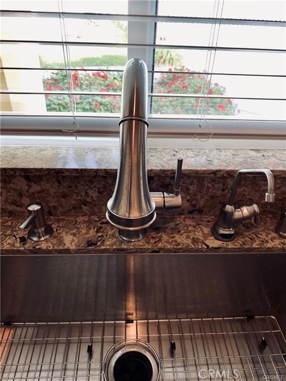 19238 Arminta Street Reseda, CA 91335 - Photo 13 of 61 a close view of sink and tap