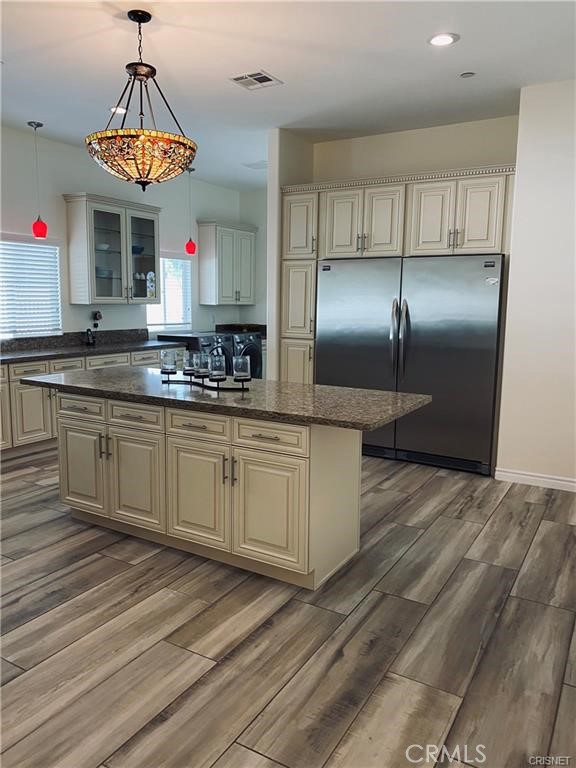 19238 Arminta Street Reseda, CA 91335 - Photo 34 of 61 a kitchen with stainless steel appliances granite countertop a sink window and cabinets