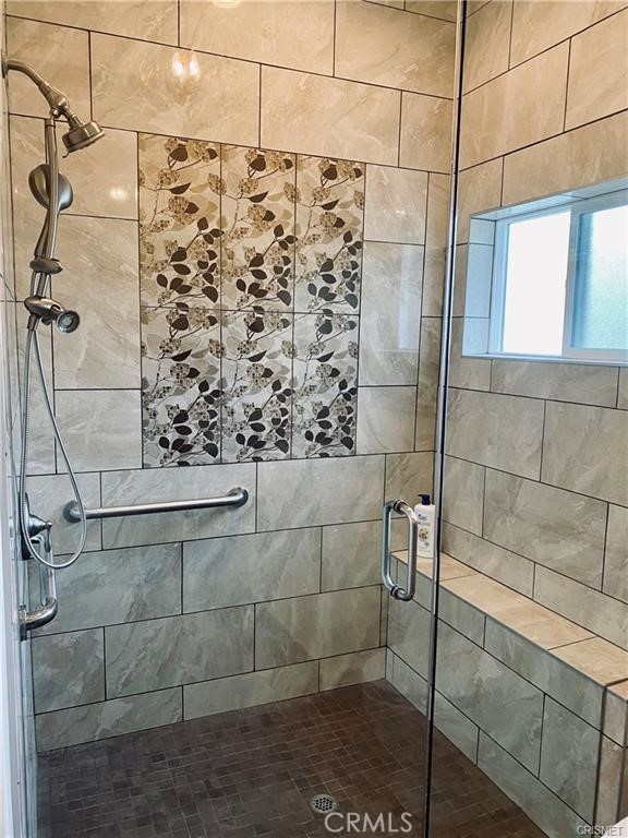 19238 Arminta Street Reseda, CA 91335 - Photo 42 of 61 a bathroom with a shower