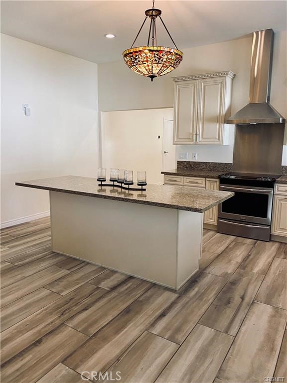 19238 Arminta Street Reseda, CA 91335 - Photo 7 of 61 a kitchen with stainless steel appliances granite countertop a sink a stove and a granite counter tops
