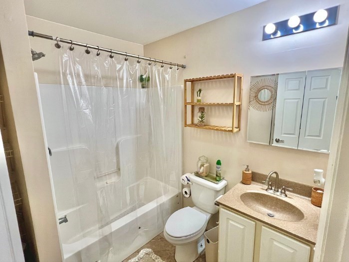 10 Milton Ridge Road, Unit 10 Lynn, MA 01902 - Photo 19 of 33 a bathroom with a sink toilet tub and shower