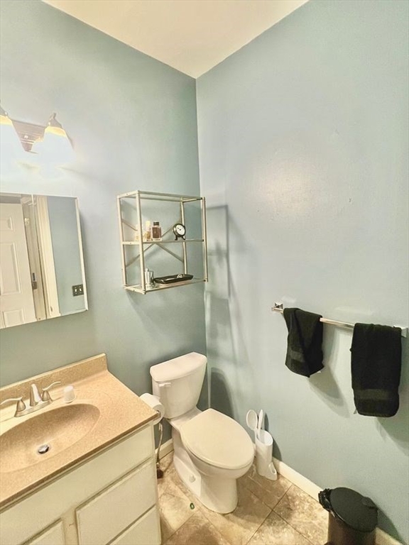 10 Milton Ridge Road, Unit 10 Lynn, MA 01902 - Photo 20 of 33 a bathroom with a sink and a toilet