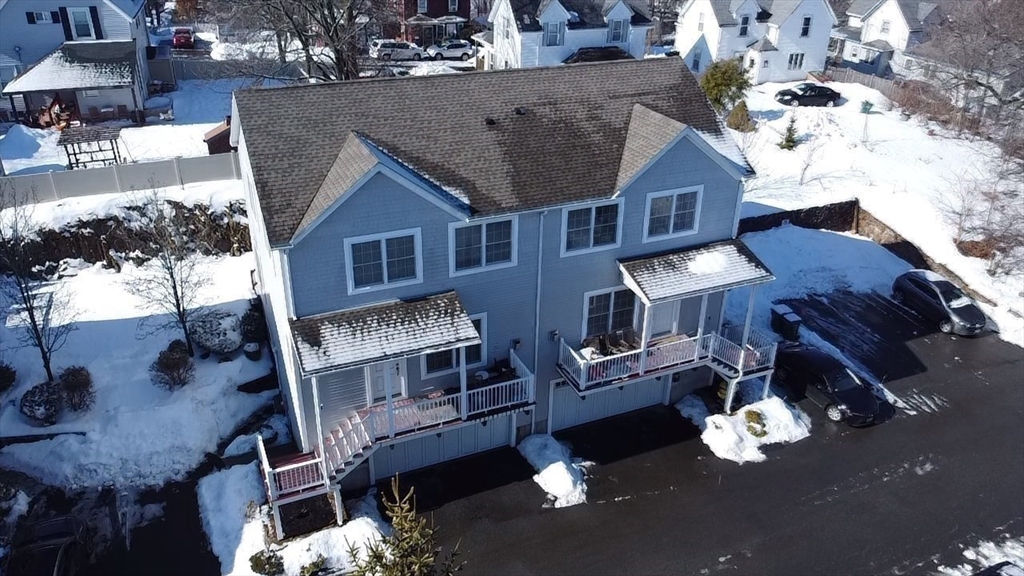 10 Milton Ridge Road, Unit 10 Lynn, MA 01902 - Photo 25 of 33 a view of a house with a patio