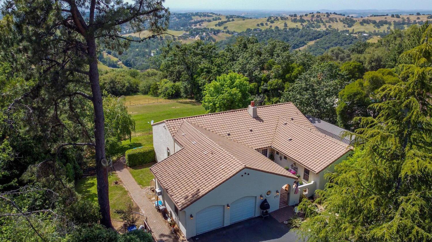12181 Winton Road Sutter Creek, CA 95685 - Photo 1 of 1 an aerial view of a house with a yard