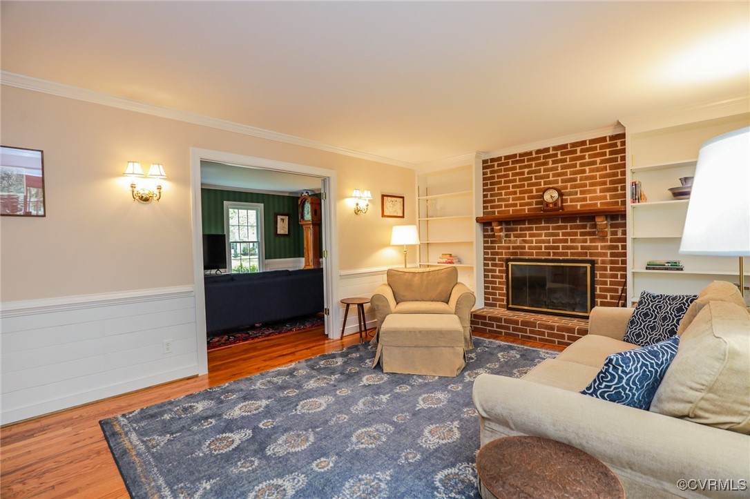 12830 Foxstone Road Midlothian, VA 23113 - Photo 15 of 42 a living room with furniture and a fireplace