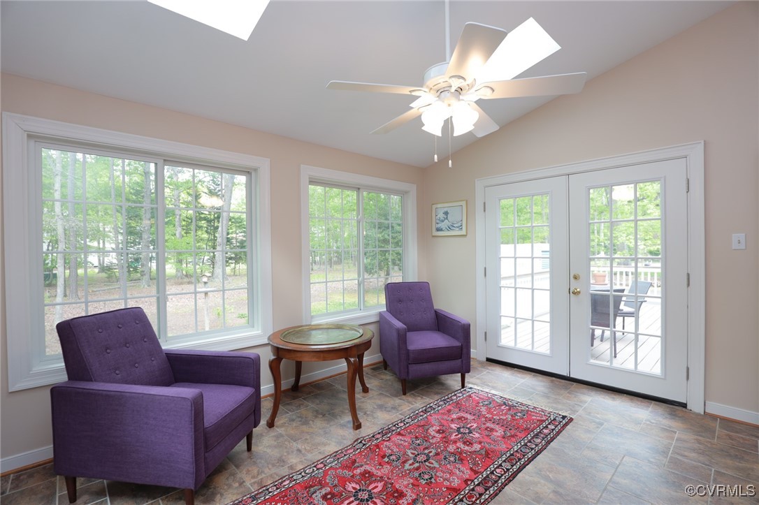 12830 Foxstone Road Midlothian, VA 23113 - Photo 17 of 42 a living room with furniture and a floor to ceiling window