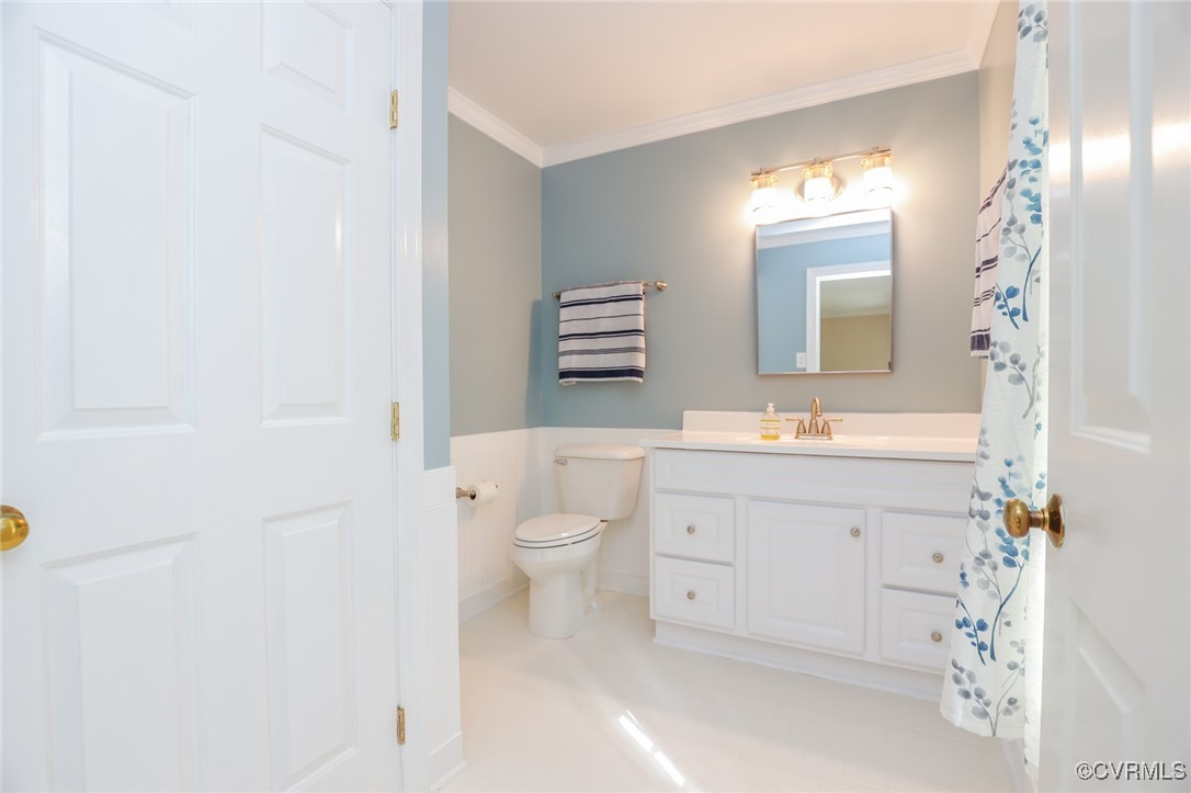 12830 Foxstone Road Midlothian, VA 23113 - Photo 24 of 42 a spacious bathroom with a sink a mirror and a toilet