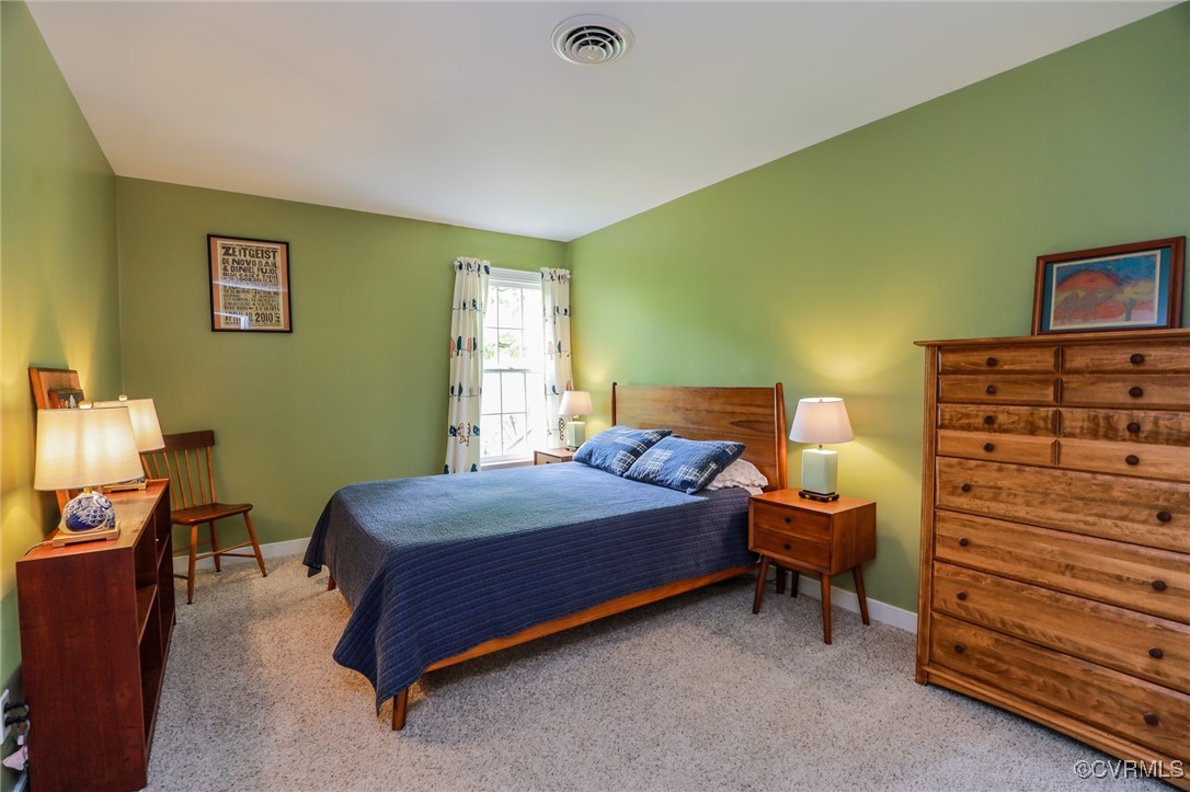 12830 Foxstone Road Midlothian, VA 23113 - Photo 25 of 42 a bedroom with a bed and a closet
