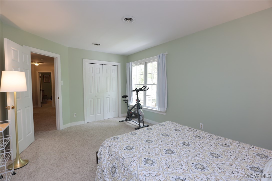 12830 Foxstone Road Midlothian, VA 23113 - Photo 30 of 42 a bedroom with a bed and a window