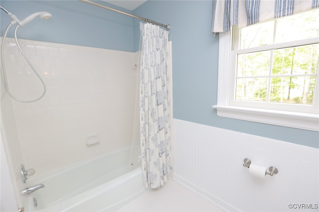 12830 Foxstone Road Midlothian, VA 23113 - Photo 33 of 42 a bathroom with a bathtub and a shower