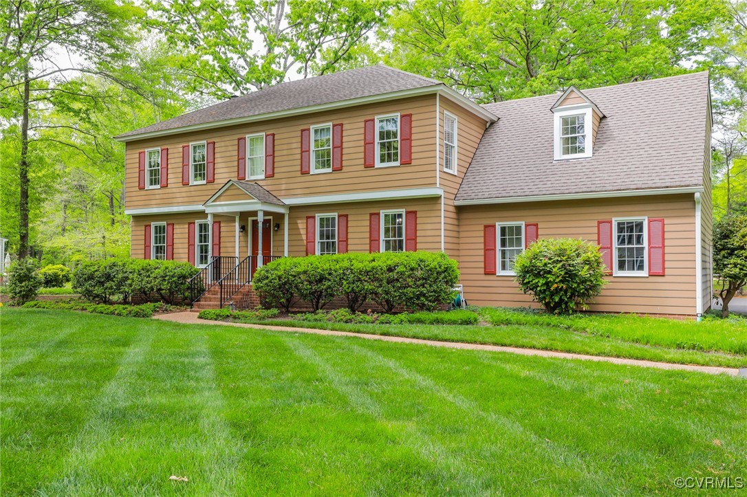 12830 Foxstone Road Midlothian, VA 23113 - Photo 40 of 42 a front view of a house with a yard