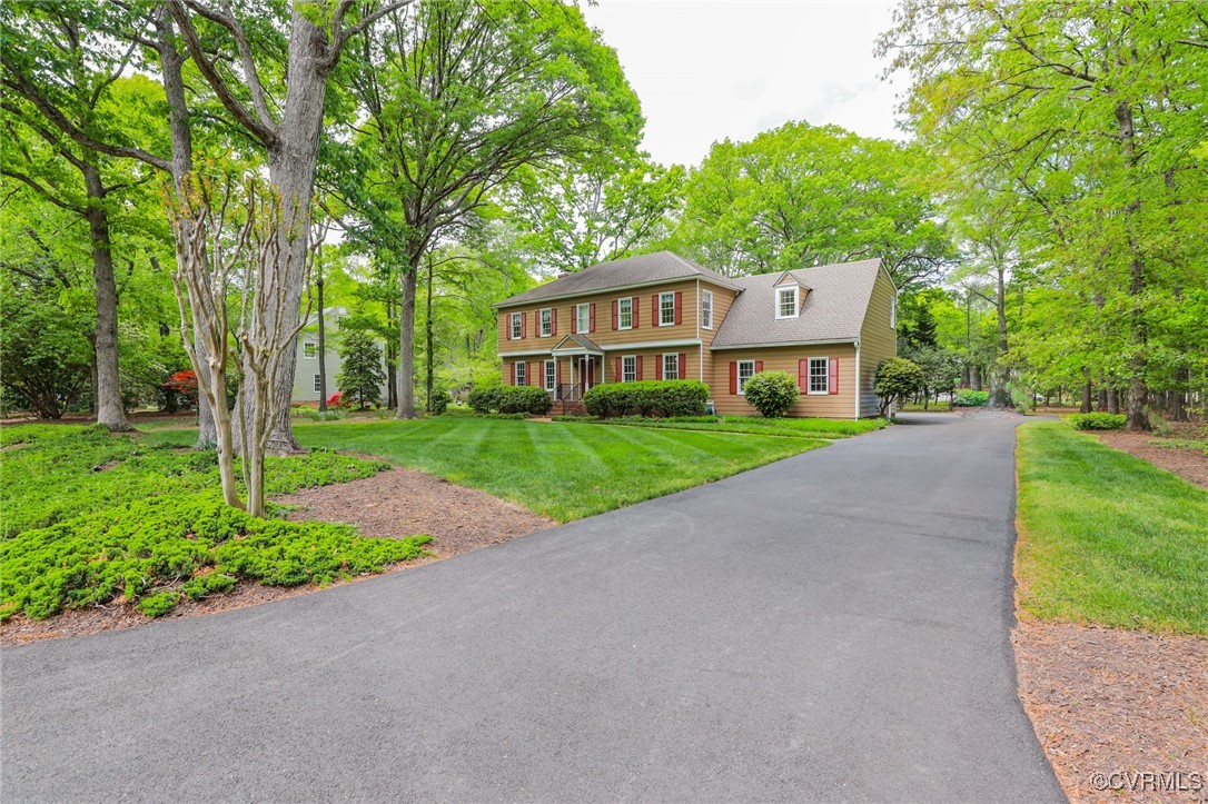 12830 Foxstone Road Midlothian, VA 23113 - Photo 41 of 42 a front view of a house with a yard and trees