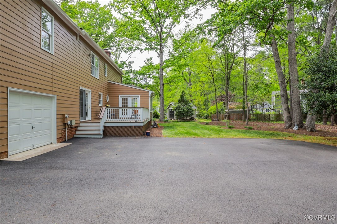 12830 Foxstone Road Midlothian, VA 23113 - Photo 42 of 42 a view of a house with a backyard and a tree