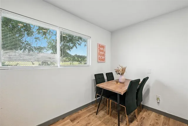 a workspace with furniture and window