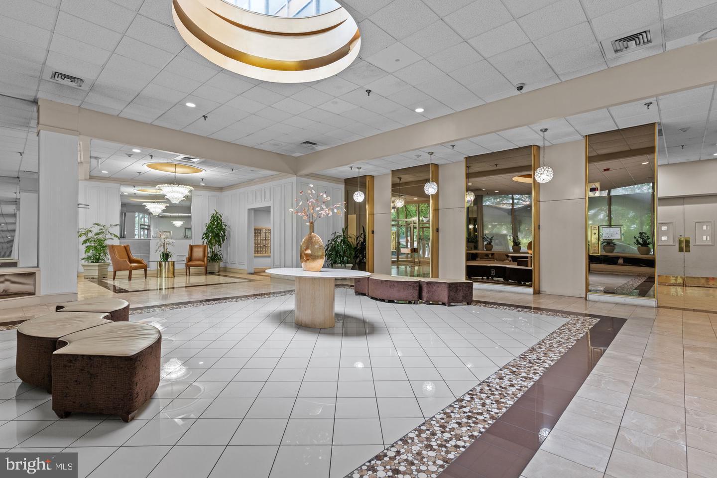 3900 West Ford Road, Unit 14K Philadelphia, PA 19131 - Photo 11 of 53 Elegant lobby with modern design elements.