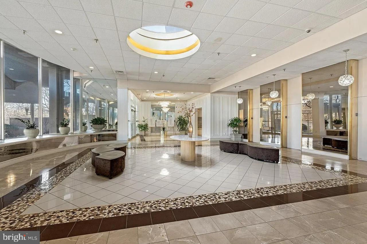 3900 West Ford Road, Unit 14K Philadelphia, PA 19131 - Photo 12 of 53 Elegant lobby with modern design elements.