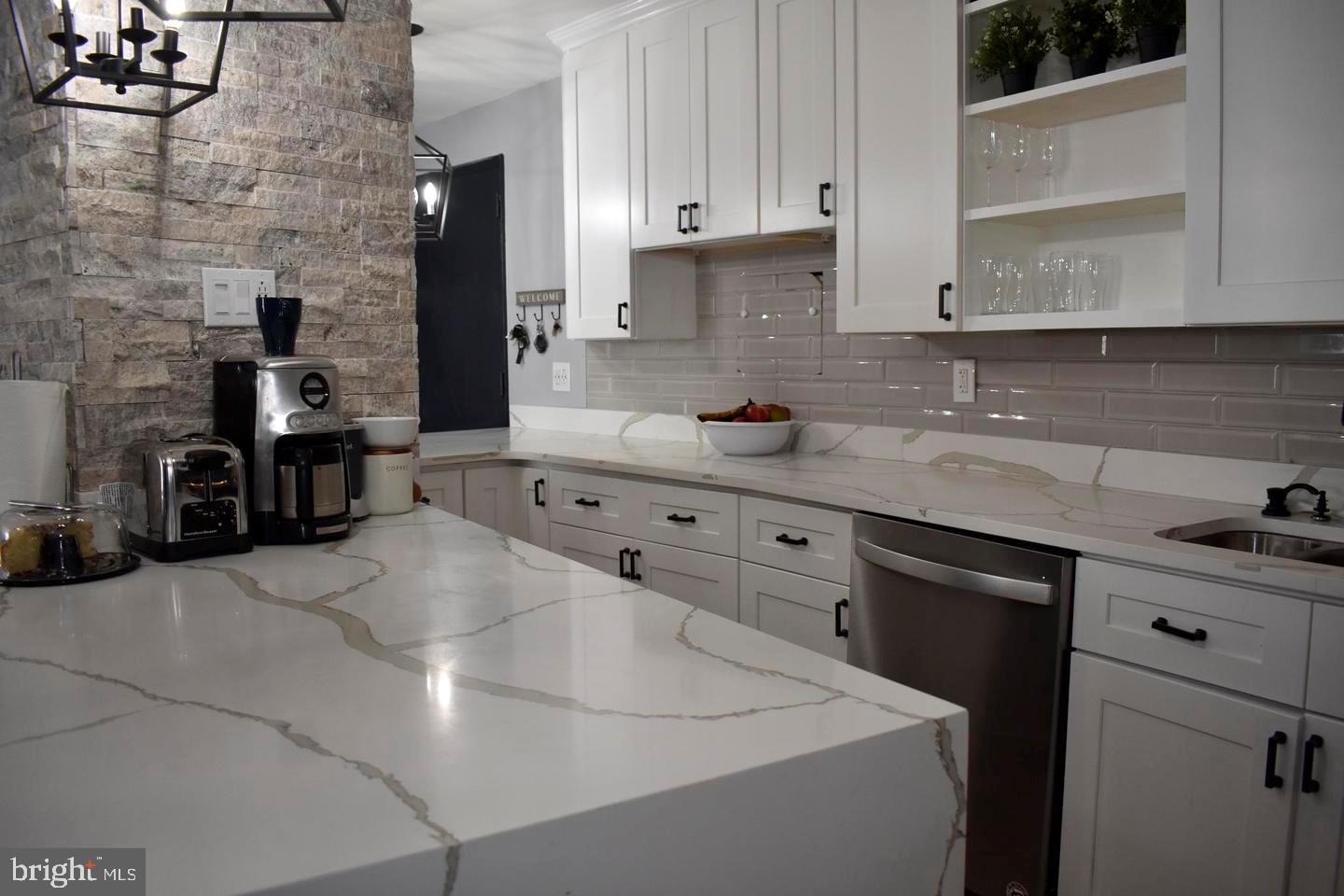 3900 West Ford Road, Unit 14K Philadelphia, PA 19131 - Photo 22 of 53 Sleek kitchen with modern finishes.