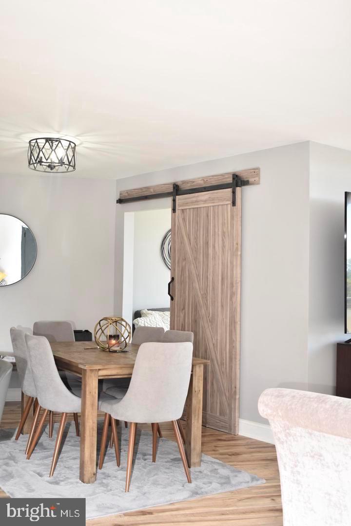 3900 West Ford Road, Unit 14K Philadelphia, PA 19131 - Photo 24 of 53 Modern dining space with rustic charm.