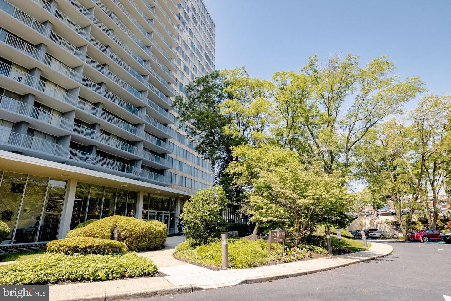 3900 West Ford Road, Unit 14K Philadelphia, PA 19131 - Photo 6 of 53 Modern high-rise with lush landscaping.