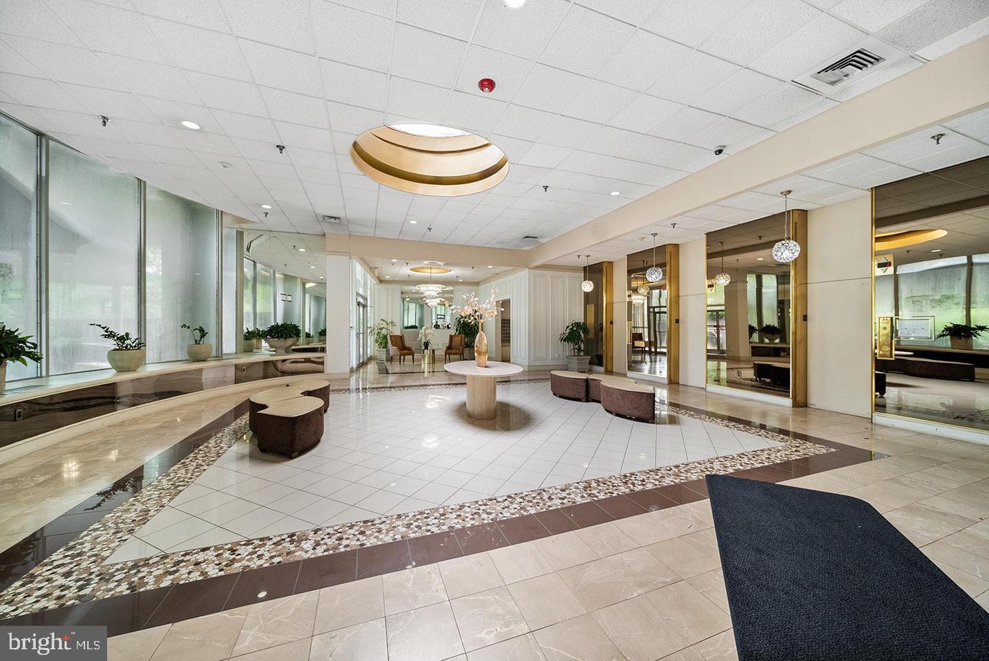 3900 West Ford Road, Unit 14K Philadelphia, PA 19131 - Photo 10 of 53 Elegant lobby with modern design elements.