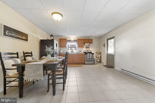 a view of a dining room kitchen and a window