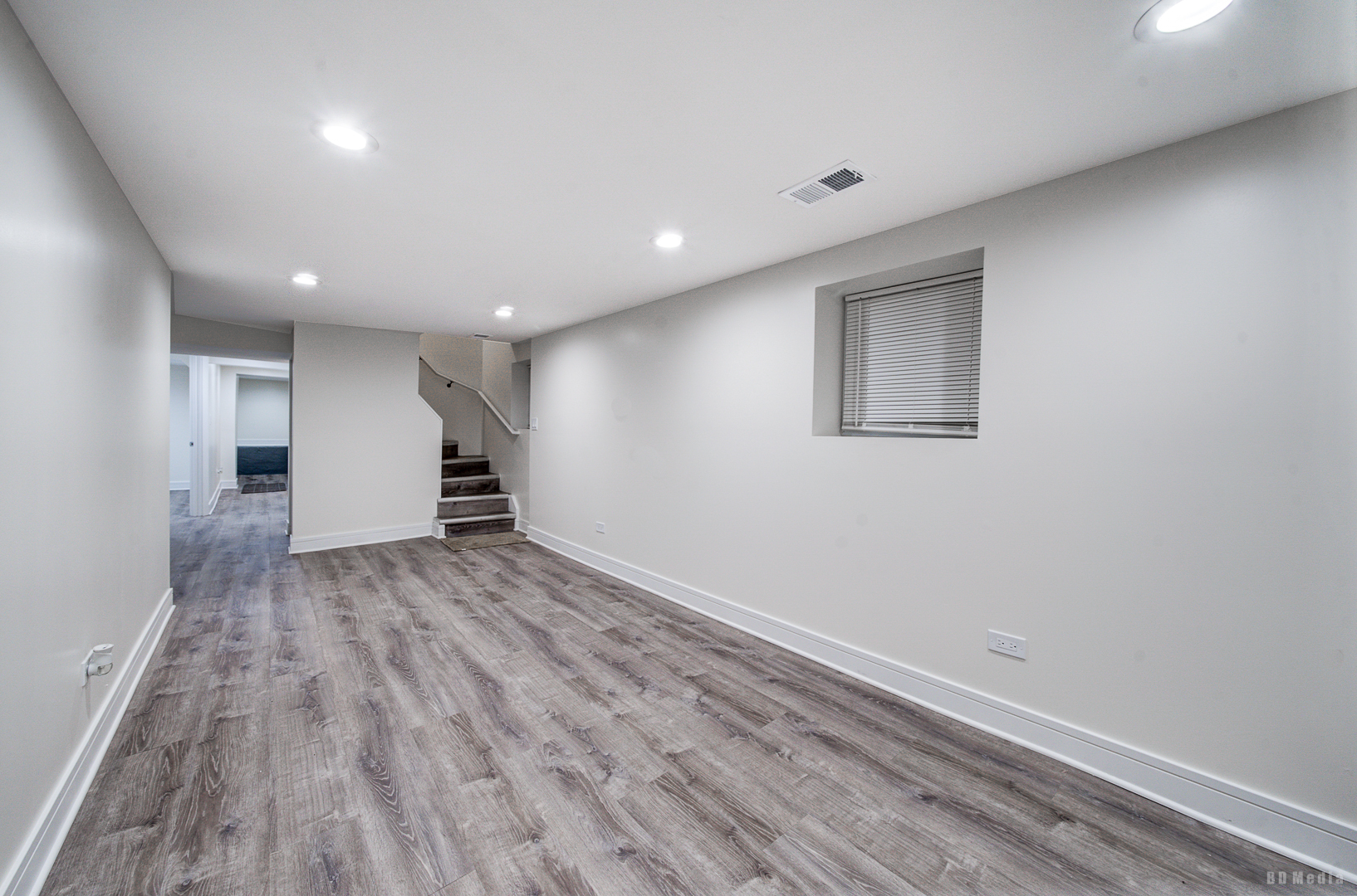 7307 South Peoria Street Chicago, IL 60621 - Photo 26 of 45 a view of empty room with wooden floor